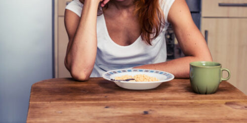 Woman doesn't want to eat her cereal